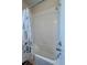 Bathroom featuring a shower/tub with tile surround and a shower curtain at 10934 79Th E St, Parrish, FL 34219