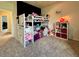 Charming bedroom with a bunk bed and colorful decorations, creating a playful atmosphere at 10934 79Th E St, Parrish, FL 34219