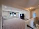 Expansive loft with carpeting, ideal for a playroom, media center, or flexible living area at 10934 79Th E St, Parrish, FL 34219