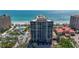 A multi-story condominium building with stunning beachfront views and a luxurious pool at 1241 Gulf Of Mexico Dr # 603, Longboat Key, FL 34228