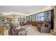 Comfortable living room showcasing plush seating, stylish décor, and an ocean view at 1241 Gulf Of Mexico Dr # 603, Longboat Key, FL 34228