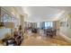 Open concept living room with hardwood floors, tasteful decor, and views of the ocean at 1241 Gulf Of Mexico Dr # 603, Longboat Key, FL 34228