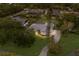Expansive aerial view of a single Gathering home with a large yard and an in-ground pool at 1411 70Th Nw St, Bradenton, FL 34209