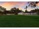 Expansive backyard with a pristine lawn and screened pool, great for outdoor activities at 1411 70Th Nw St, Bradenton, FL 34209