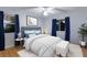 Stylishly designed bedroom with bright blue accents and modern decor at 1411 70Th Nw St, Bradenton, FL 34209