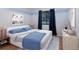 Bright bedroom with neutral tones, streamlined furniture, and a soothing ambiance at 1411 70Th Nw St, Bradenton, FL 34209