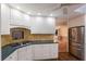 Well-appointed kitchen features stainless steel appliances and custom tile backsplash at 1411 70Th Nw St, Bradenton, FL 34209