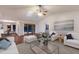 Bright living room with open floor plan, comfortable seating, and view of pool and dining area at 1411 70Th Nw St, Bradenton, FL 34209