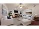 Spacious living room featuring vaulted ceiling, fireplace, and comfortable seating at 1411 70Th Nw St, Bradenton, FL 34209