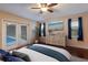 Comfortable main bedroom with hardwood floors and pool access at 1411 70Th Nw St, Bradenton, FL 34209