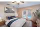 Serene main bedroom features pool views and an abundance of natural light at 1411 70Th Nw St, Bradenton, FL 34209