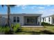 Backyard with patio and lawn at 16114 Ivy Ridge Ct, Port Charlotte, FL 33953