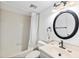 Cozy bathroom featuring shower and tub with a modern, classic aesthetic at 1711 Pelican Cove Rd # 443, Sarasota, FL 34231