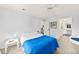 Bright bedroom with laminate flooring and a ensuite access at 1711 Pelican Cove Rd # 443, Sarasota, FL 34231
