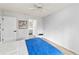 Bright bedroom with laminate flooring and ensuite access at 1711 Pelican Cove Rd # 443, Sarasota, FL 34231