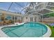 Sparkling pool and screened lanai offer the ideal outdoor entertaining space at 1960 Lincoln Dr, Sarasota, FL 34236