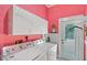 Vibrant laundry room with white appliances and storage space at 1960 Lincoln Dr, Sarasota, FL 34236