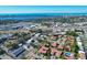 Aerial view showcases community near shopping, dining, and bay at 2267 Pueblo Ln # V40, Sarasota, FL 34231