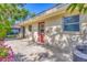 Backyard with a patio and red door at 2267 Pueblo Ln # V40, Sarasota, FL 34231