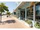 Charming storefront with ample windows and decorative planters adding to the welcoming atmosphere at 2267 Pueblo Ln # V40, Sarasota, FL 34231