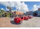 Street view of novelty vehicles parked near shops with clear blue skies in the background at 2267 Pueblo Ln # V40, Sarasota, FL 34231