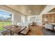 Bright dining area offering booth seating, and relaxing views of the lush landscaping at 228 Saint James Park, Osprey, FL 34229