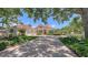 Charming home with brick driveway and manicured landscaping at 228 Saint James Park, Osprey, FL 34229