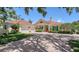 Charming home with brick driveway and manicured landscaping at 228 Saint James Park, Osprey, FL 34229