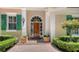 Close up of home entrance with brick pavers and beautiful landscaping at 228 Saint James Park, Osprey, FL 34229