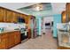 Spacious kitchen with stainless appliances, ample cabinets, and access to living areas at 23088 Allen Ave, Port Charlotte, FL 33980