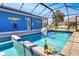Outdoor enclosed pool area with table and chairs, and blue wall accents at 23088 Allen Ave, Port Charlotte, FL 33980