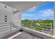 Balcony with wooden tile offers expansive views of the complex and city skyline at 2450 Harbourside Dr # 233, Longboat Key, FL 34228