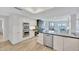 Bright, updated kitchen with stainless steel appliances and granite countertops at 2450 Harbourside Dr # 233, Longboat Key, FL 34228