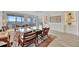 Open living area with large windows offering ample natural light and serene water views at 2450 Harbourside Dr # 233, Longboat Key, FL 34228