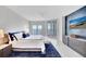 A spacious main bedroom boasts beautiful decor, plentiful natural light, and ample space at 2450 Harbourside Dr # 233, Longboat Key, FL 34228