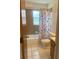 Bathroom featuring shower and bathtub, toilet, sink, and neutral paint at 2716 81St E Ave, Ellenton, FL 34222