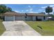 Charming single story home featuring an attached two car garage and well maintained lawn at 2716 81St E Ave, Ellenton, FL 34222