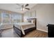 Cozy bedroom featuring a comfortable bed, natural light, and stylish decor at 2819 Conch Hollow Dr, Brandon, FL 33511