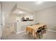 Bright dining area next to a well-equipped kitchen, perfect for Gathering meals and gatherings at 2819 Conch Hollow Dr, Brandon, FL 33511