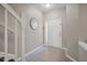Bright foyer with tile flooring, fresh paint, updated hardware, and a staircase at 2819 Conch Hollow Dr, Brandon, FL 33511