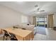 Open living room with sliding glass doors to the backyard and comfortable seating area at 2819 Conch Hollow Dr, Brandon, FL 33511