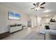 Comfortable living room boasting tile floors and ample natural light, leading into the kitchen at 2819 Conch Hollow Dr, Brandon, FL 33511