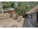 Backyard with a chicken coop, providing ample space for outdoor activities at 2848 Trinidad St, Sarasota, FL 34231