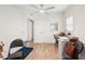 This bedroom is a blank canvas, complete with an overhead fan, wood flooring and an adaptable nook for work or hobbies at 2848 Trinidad St, Sarasota, FL 34231