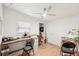 Office space with desk, chairs, storage, and ceiling fan at 2848 Trinidad St, Sarasota, FL 34231