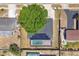 Aerial view of a home featuring solar panels, screened in pool, and fenced yard at 3136 Webber St, Sarasota, FL 34239