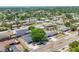 Panoramic aerial view of a residential neighborhood featuring tree-lined streets and well-maintained homes at 3136 Webber St, Sarasota, FL 34239