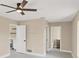 Spacious bedroom featuring a ceiling fan, recessed lighting, and access to a mini-bar and ensuite bathroom at 3136 Webber St, Sarasota, FL 34239