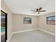 Bedroom with view of a screened pool and backyard at 3136 Webber St, Sarasota, FL 34239