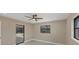 Bedroom with view to the pool area and backyard at 3136 Webber St, Sarasota, FL 34239